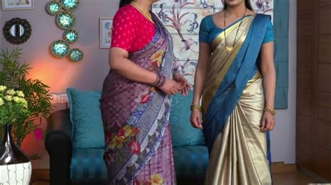 satin aunty|43: Chubby aunty in a beautiful violet milky satin silk saree.